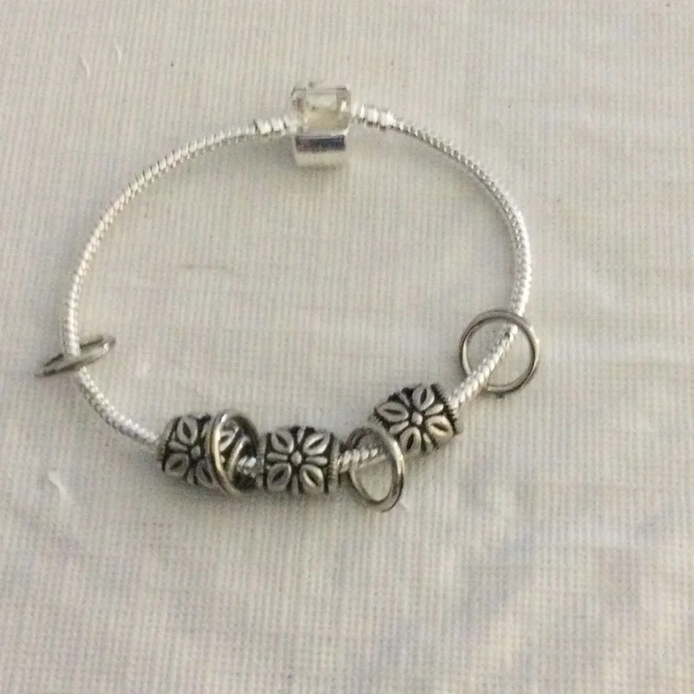 Silver Color Charm Bracelet with Intricate Floral Beads. NWOT